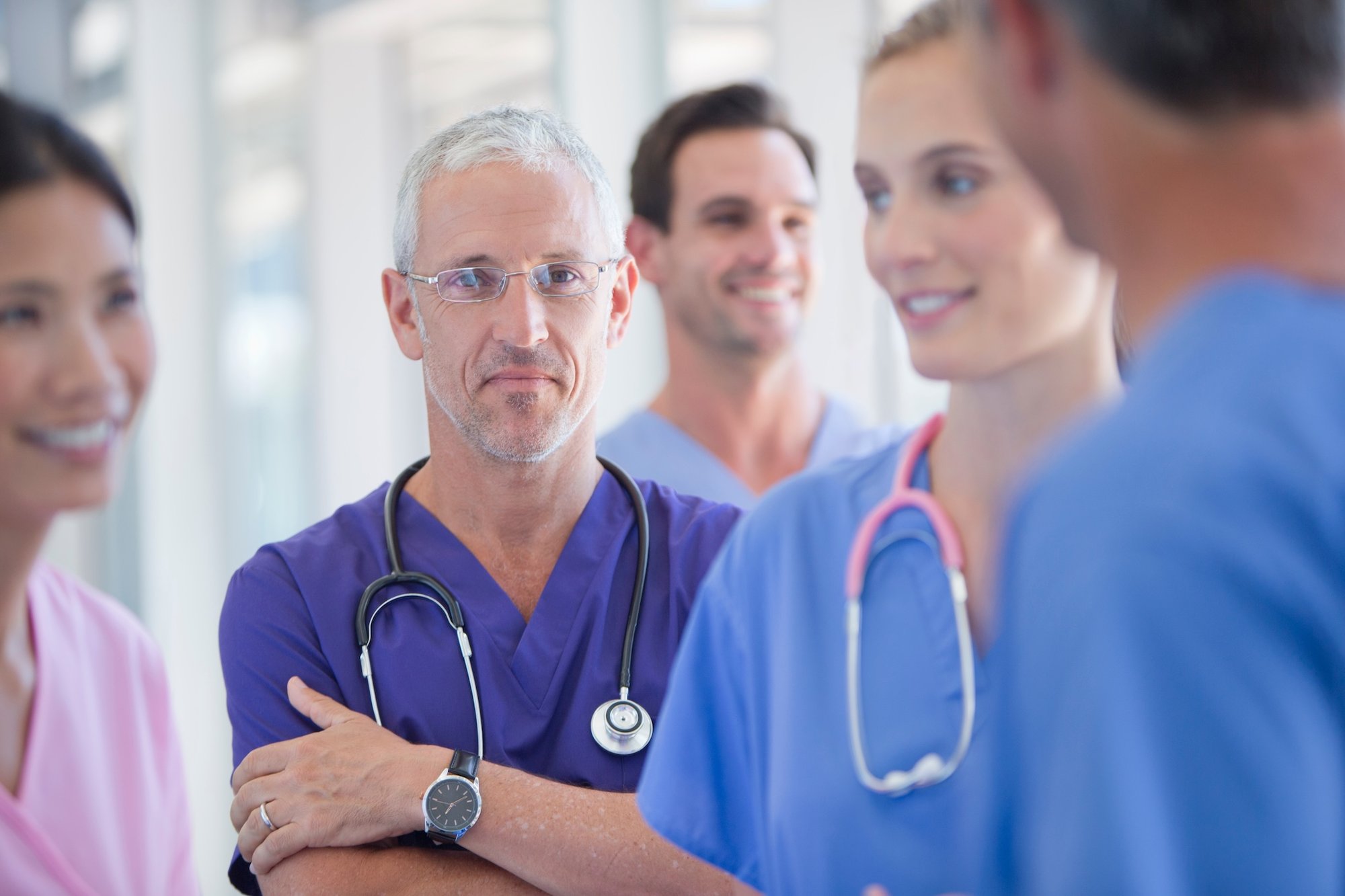 medical-professionals-smiling-in-hospital-setting-2026-01-11-09-56-50-utc