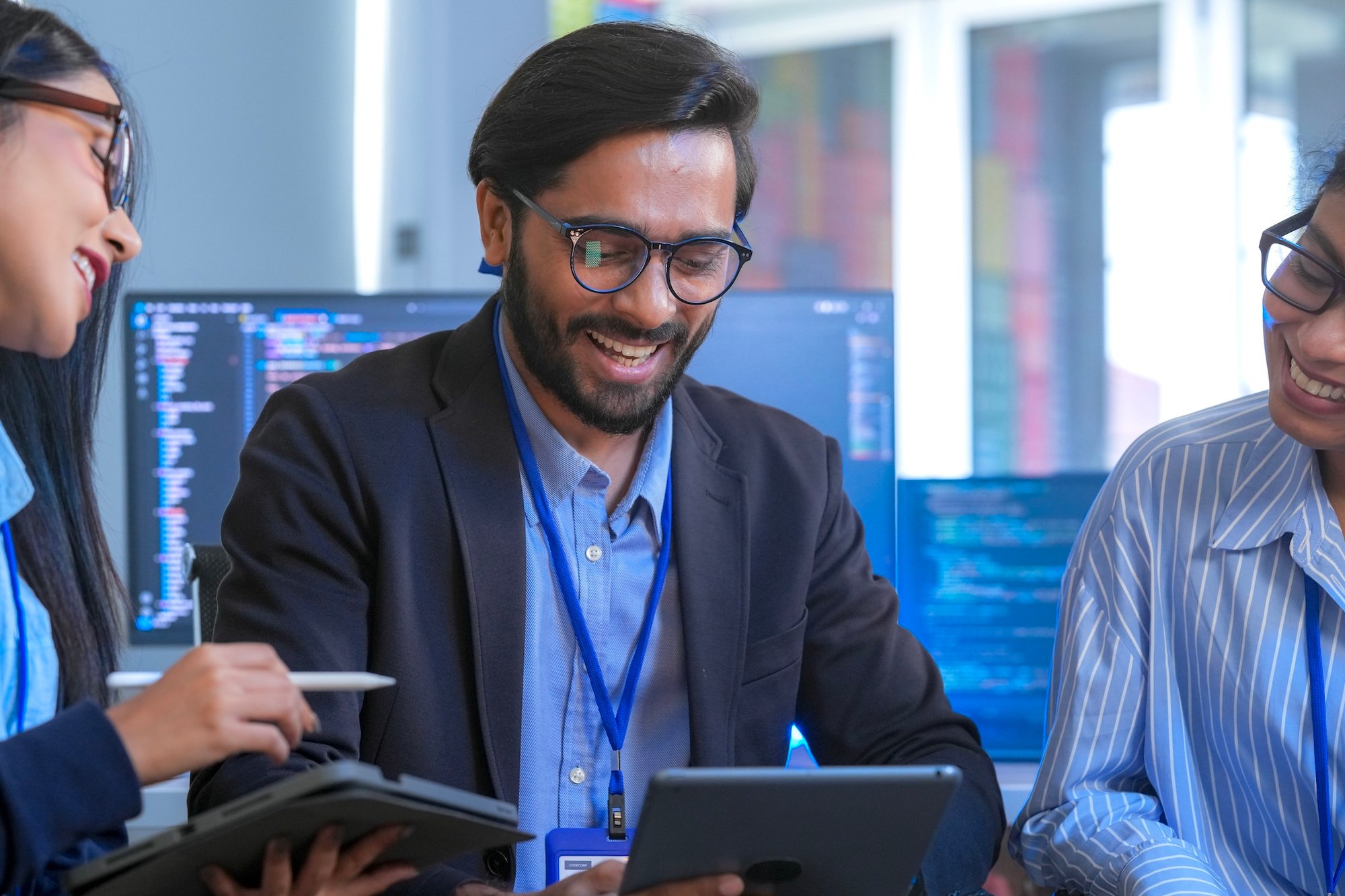 smiling-colleagues-work-together-on-technology-pro-2026-01-11-10-13-37-utc